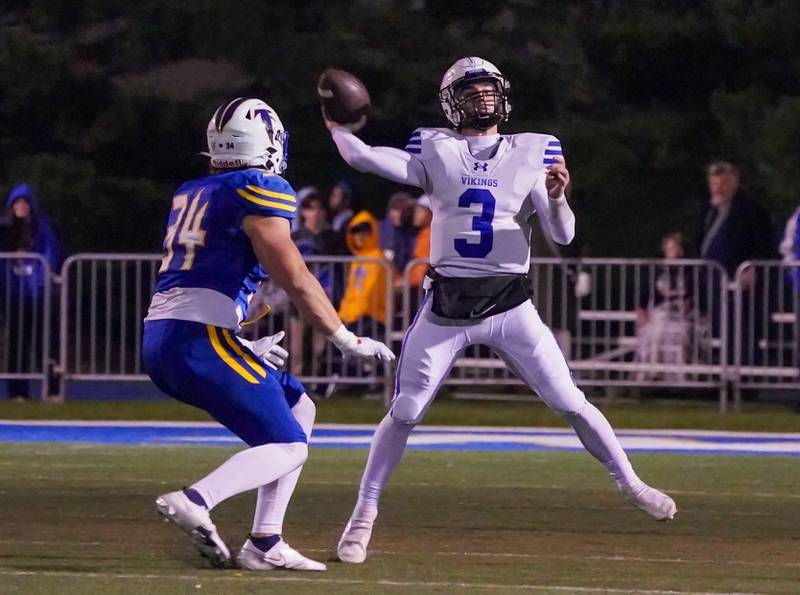 Geneva’s Nate Stempowski (3) throws a pass against Wheaton North during a football game at Wheaton North High School on Friday, Oct. 6, 2023.