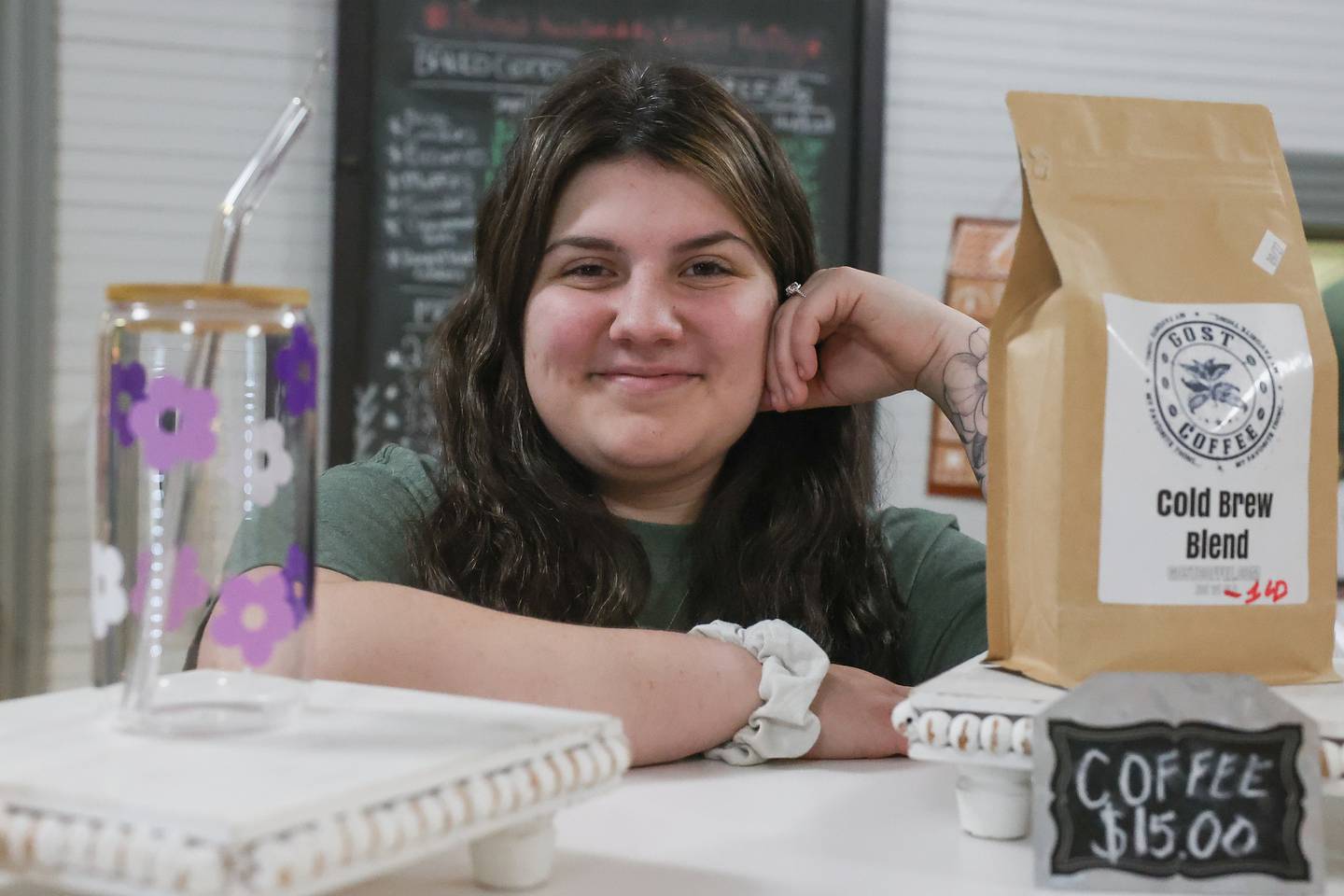 Megan DiCaro poses for a photo at her bakery Springview Sweets Bakery located at the Lockport Metra train station in downtown Lockport on Friday, Dec.15th. Megan is current in 1st place in The Greatest Baker online voting contest, presented by Cake Boss Buddy Valastro.