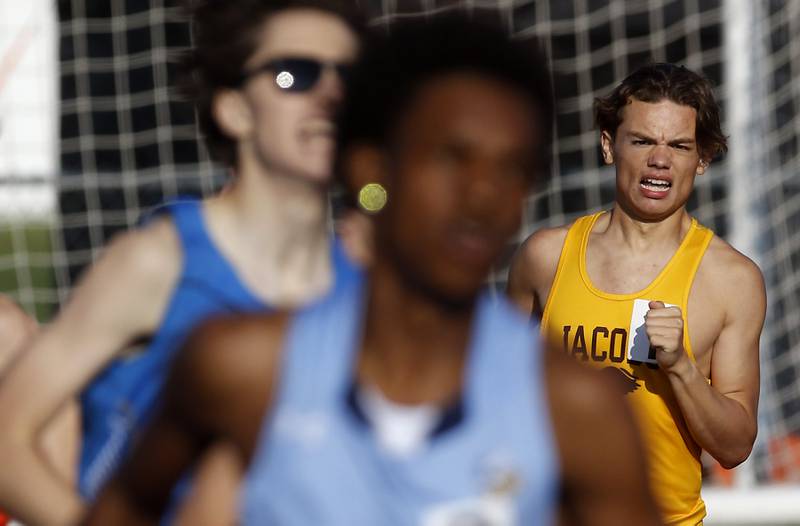 Jacobs’ Andrew Beyer runs the first leg of the 4 x 800 meter relay during the Huntley IHSA Class 3A Boys Sectional Track and Field Meet on Wednesday, May 15, 2024, at Huntley High School.