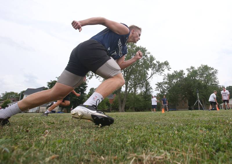 Fieldcrest's Jackson Hakes lunges around a cone while practicing on Monday, July 8, 2024 at Fieldcrest High School.