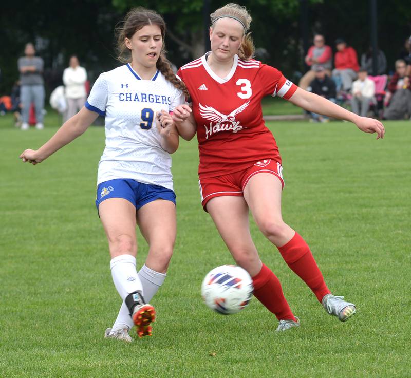 Oregon's Deborah Schmid (3) and Aurora Central Catholic's Amanda Bush battle for the ball at the 1A Oregon Regional on Tuesday, May 14, 2024.