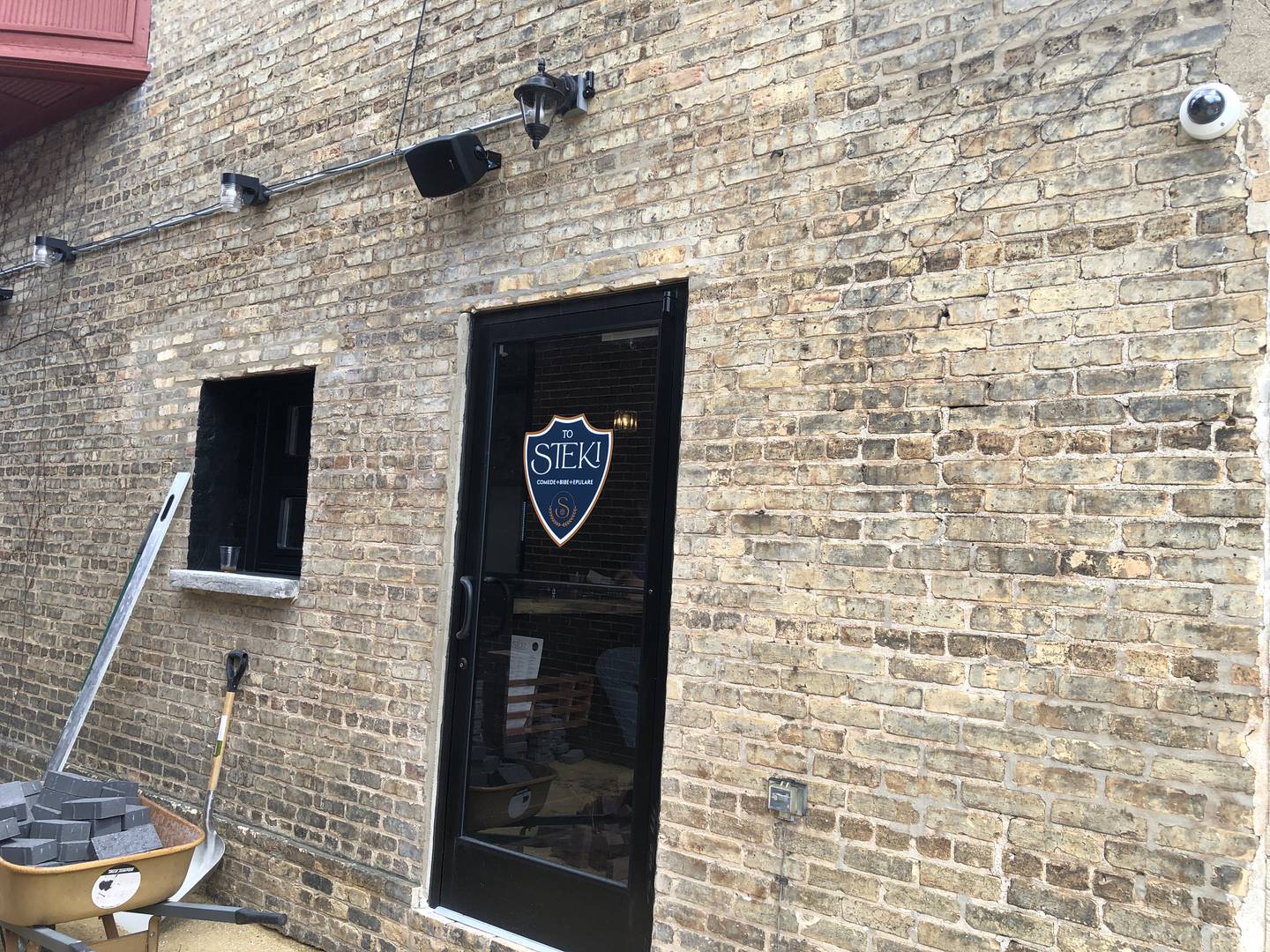 What was an alleyway at 3918 Main Street, McHenry, is in the process of becoming a patio for To Steki, a Greek-and-American restaurant which held it grand opening on May 1, 2024.