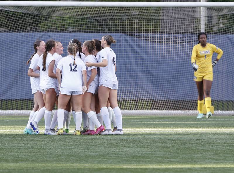 New Trier celebrates a goal as Lyons goalkeeper Nora Ezike looks on during the Class 3A Dominican super-sectional between New Trier and Lyons Township in River Forest on Tuesday, May 28, 2024.