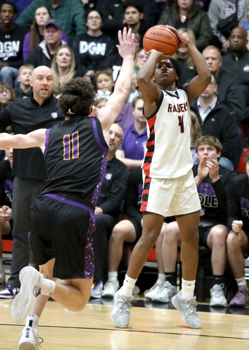 Bolingbrook’s K.J. Cathey shoots the ball during the Class 4A East Aurora Boys Basketball Sectional final against Downers Grove North on Friday, March 1, 2024.