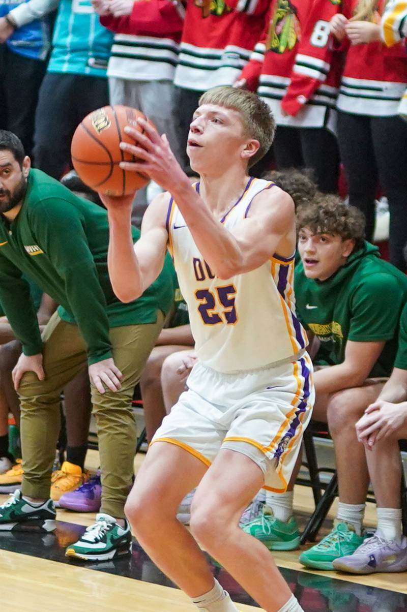Downers Grove North's Alex Miller (25) spots up for a three point shot against Waubonsie Valley during a Class 4A East Aurora sectional semifinal basketball game at East Aurora High School on Wednesday, Feb 28, 2024.