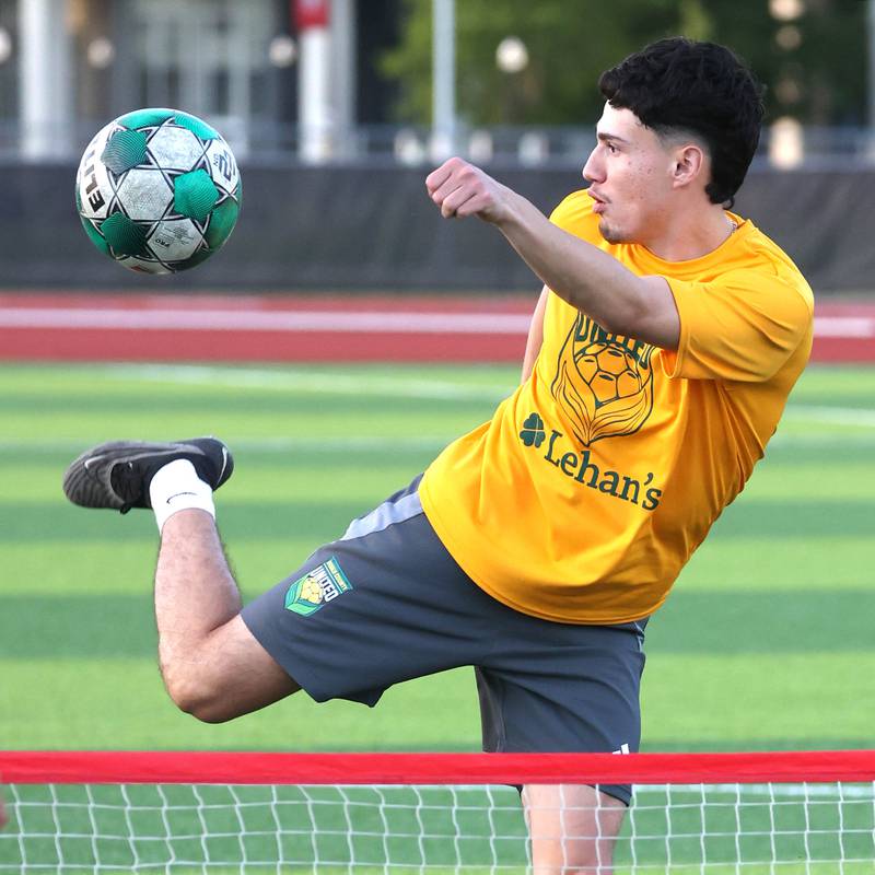 DeKalb County United’s Julian Garcia, from DeKalb, kicks the ball Thursday, June 6, 2024, during practice at the Northern Illinois University Soccer and Track and Field Complex in DeKalb.