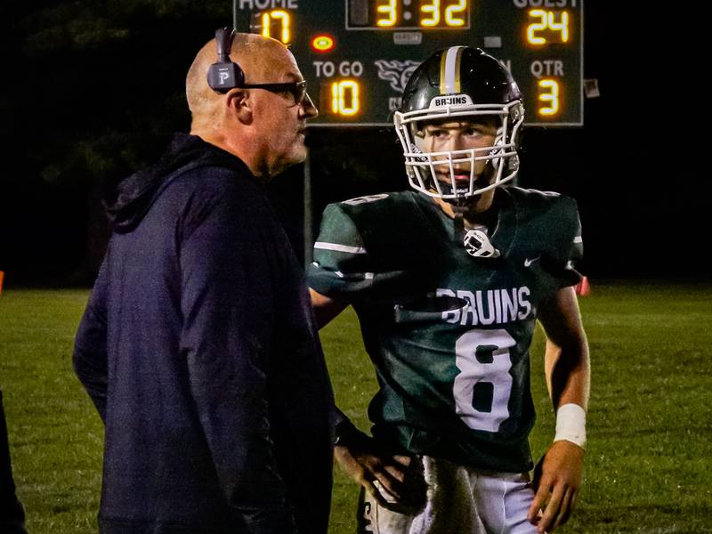 Gino Ferrari of St. Bede talks with coach on Friday, September 6, 2024 at St. Bede in Peru.