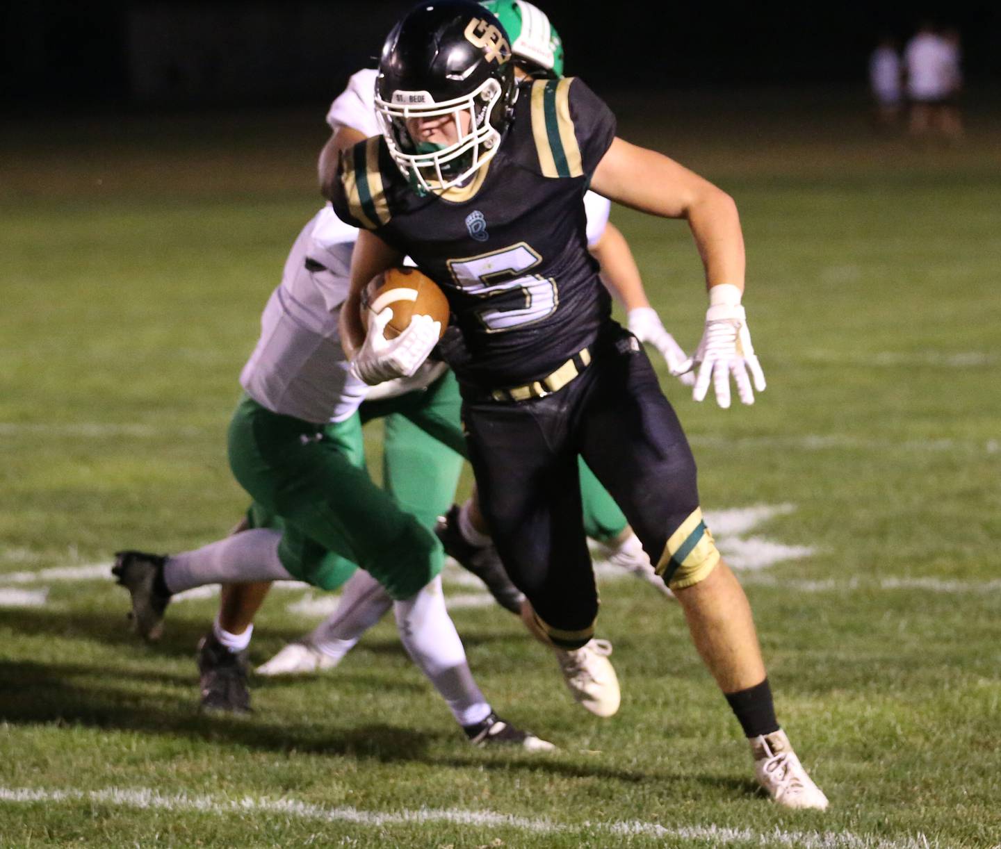 St. Bede's Halden Hueneburg runs the football against Ridgewood on Friday, Sept. 15, 2023 at St. Bede Academy.