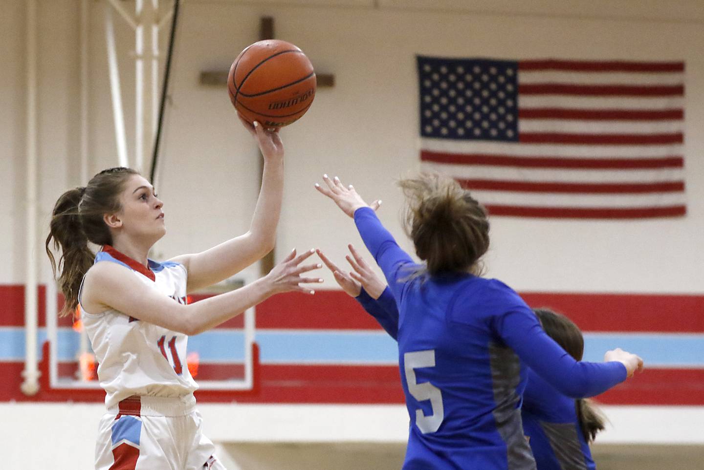 Marian Central's Kerri Johnson shoots the ball over Westlake Christian’s Juliette Sigurnjak during a non-conference girls basketball game Monday, Feb. 6, 2023, at Marian Central High School  in Woodstock.