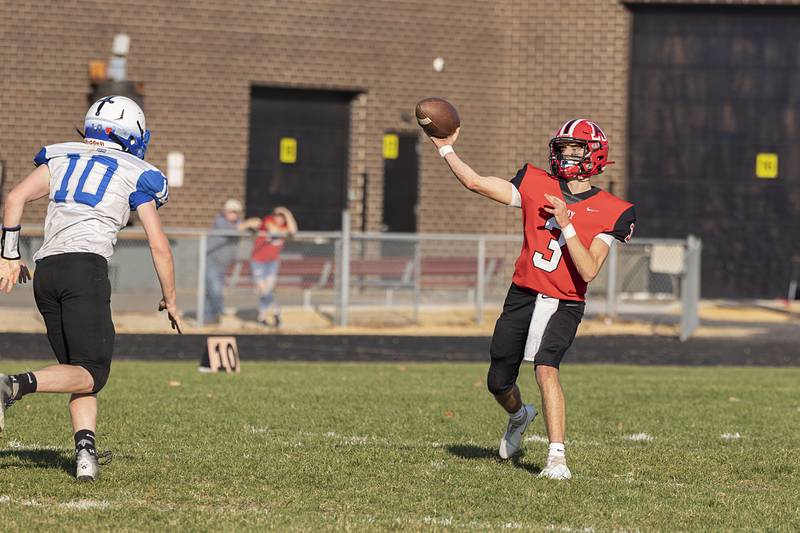 Amboy’s Tucker Lindenmeyer fires a pass downfield in the second quarter of the Clippers’ first round playoff game Saturday, Oct. 29, 2022 against Blue Ridge.