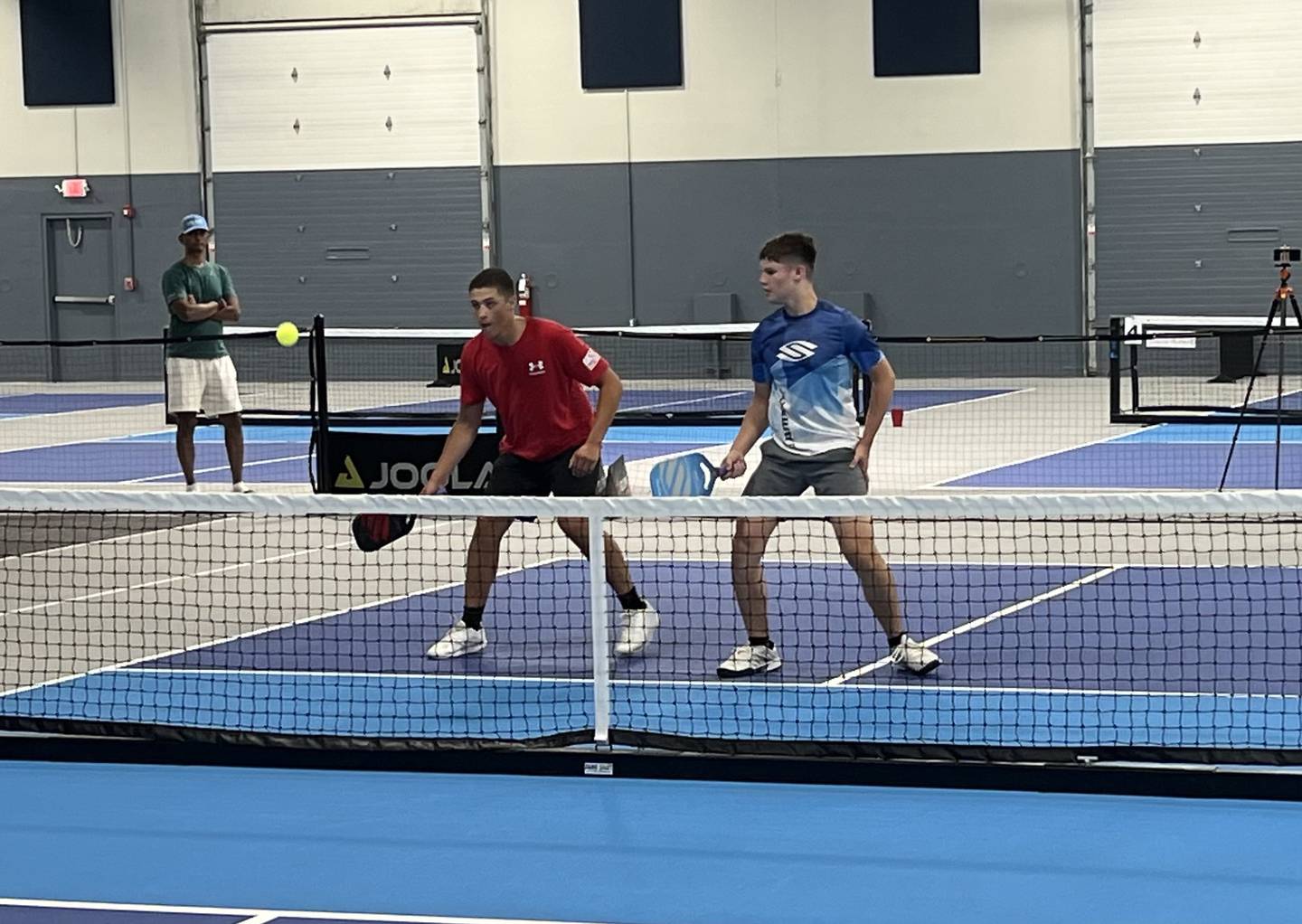 The Yorkville team of Carson Converse and Josiah Aguado compete in the first unofficial Illinois High School Pickleball Championship in June in Naperville.