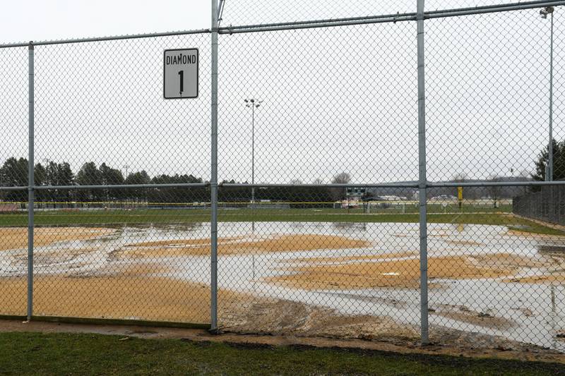 Heavy rain followed by a hail storm hit Oregon Tuesday morning flooding low-lying areas. This is field 1 at Oregon Park West.