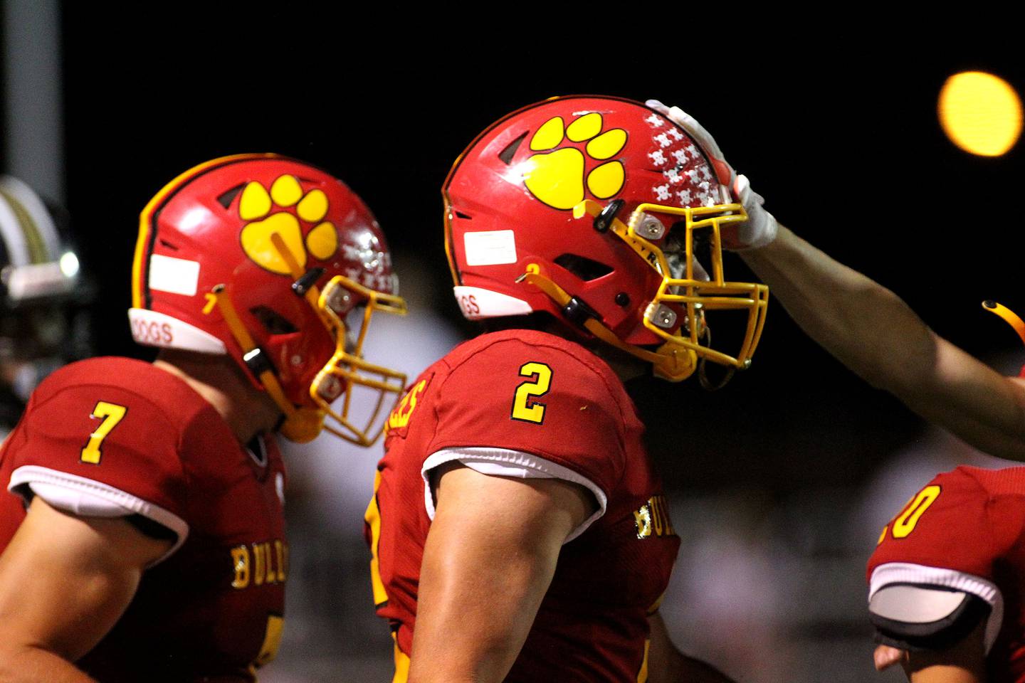 Batavia's Drew Bartels (2) is congratulated by teammates after forcing a turnover during a home game against Glenbard North on Friday, Sept. 24, 2021.