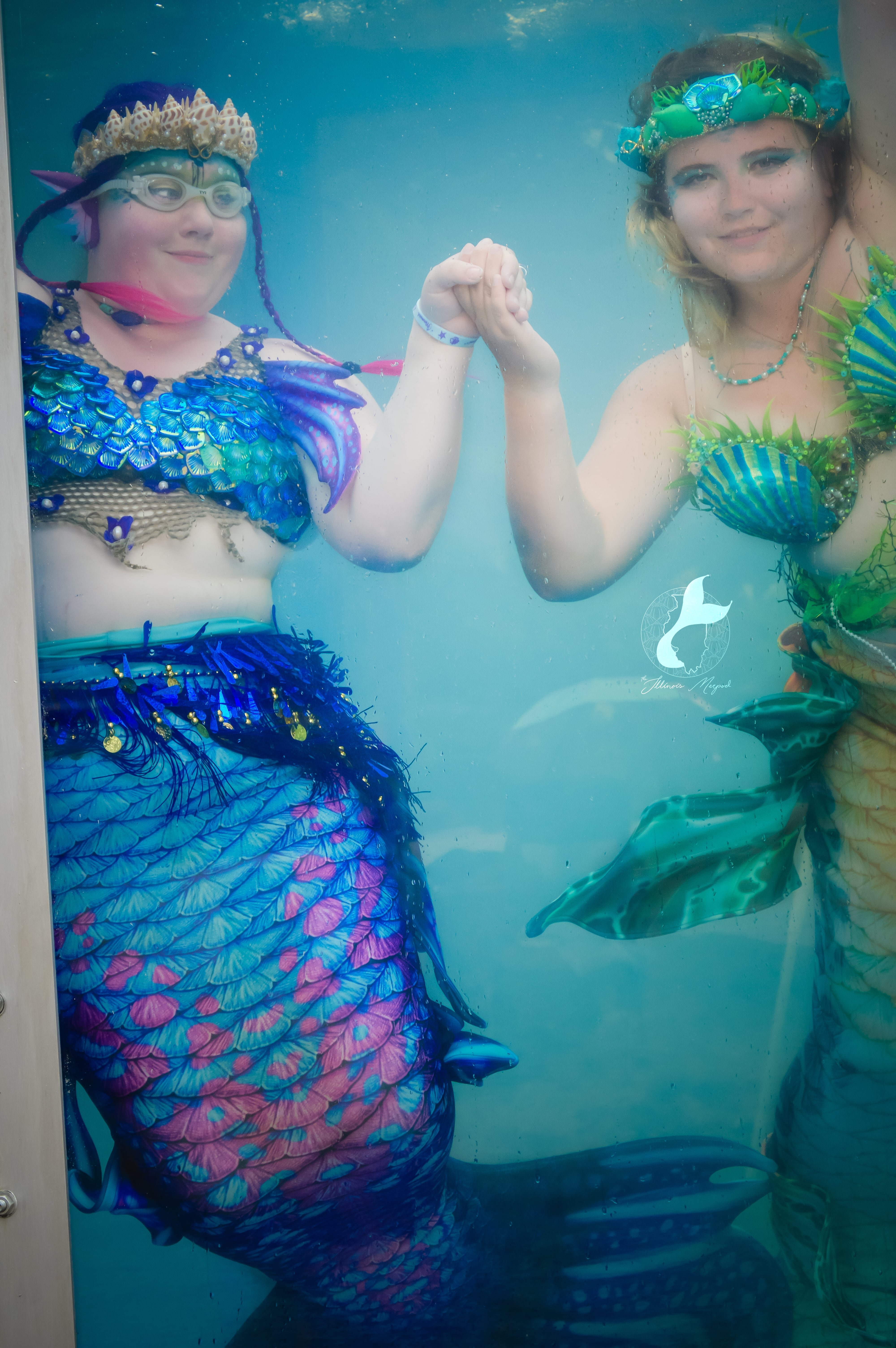 Illinois Mer-Pod member Raye Maron (left) with a fellow mermaid.