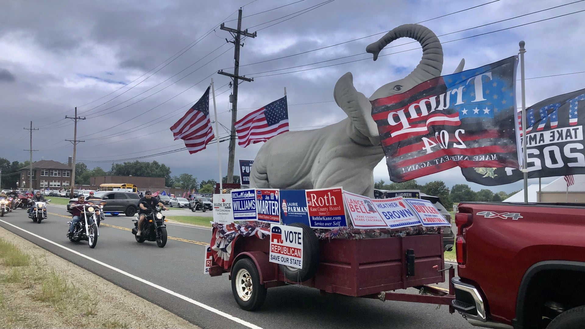 A caravan of Kane County Republicans depart from Lilly Lake Grade School for the Trump rally in McHenry on Aug. 18, 2024.