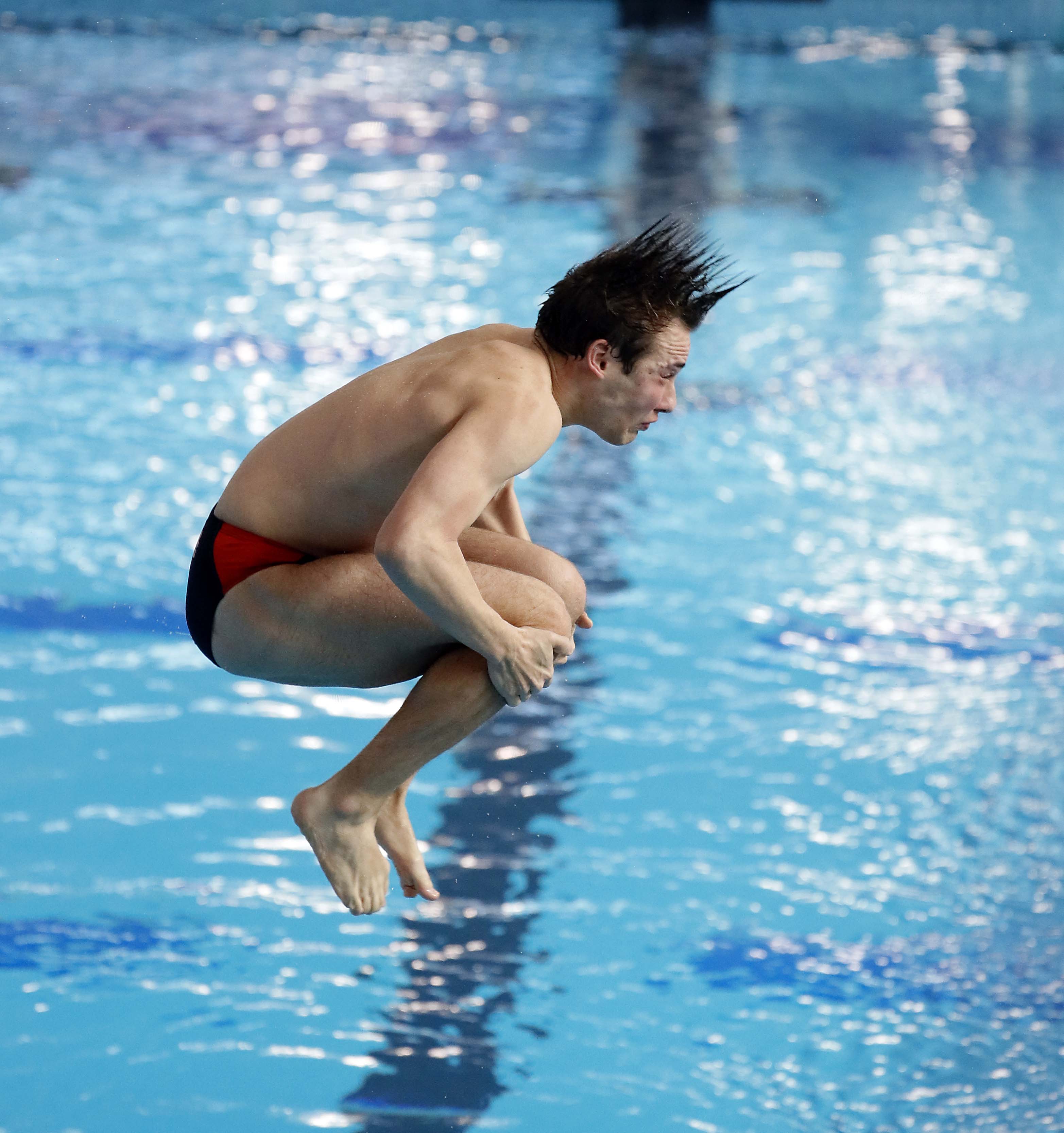 Holden Wheeler of Buffalo Grove competes in the Boys 1 mtr Diving during the IHSA Boys state swim finals Saturday February 25, 2023 in Westmont.