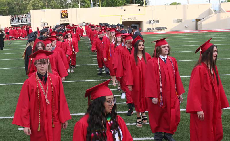 La Salle-Peru Township High School class of 2024 students enter  in procession during the 126th annual commencement graduation ceremony on Thursday, May 16, 2024 in Howard Fellows Stadium.