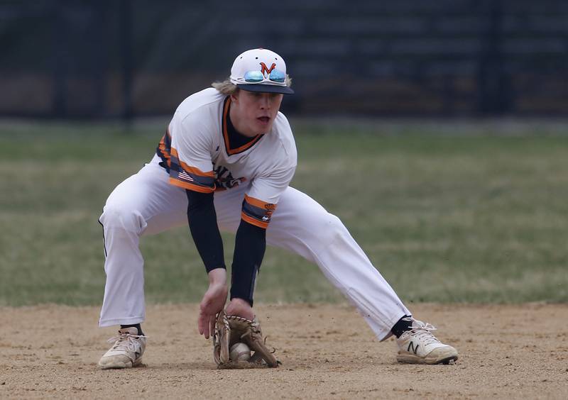 McHenry’s Gavin Micklinghoff fields the ball during a Fox Valley Conference baseball game Friday, April 15, 2022, between Jacobs and McHenry at Petersen Park in McHenry.