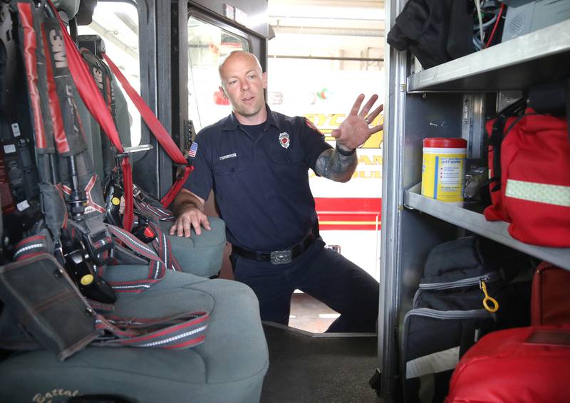Ian Wheeler, a Sycamore firefighter/paramedic, talks about the items carried aboard one of the engines Tuesday, June 11, 2024, at Sycamore Fire Station 1.