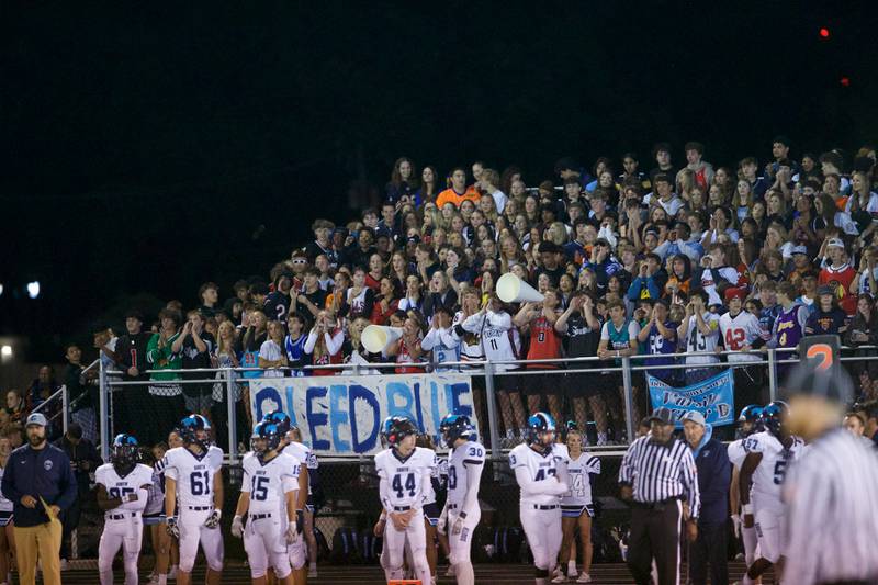 Downers Grove South fans cheer the Mustangs against Downers Grove North on Friday Sept. 6,2024 in Downers Grove.