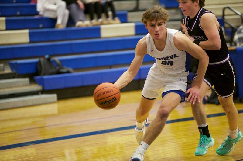 Geneva's Jack Hatton drives the baseline against Hampshire at Geneva Day of Hoops on Monday, Jan. 15th in Geneva.