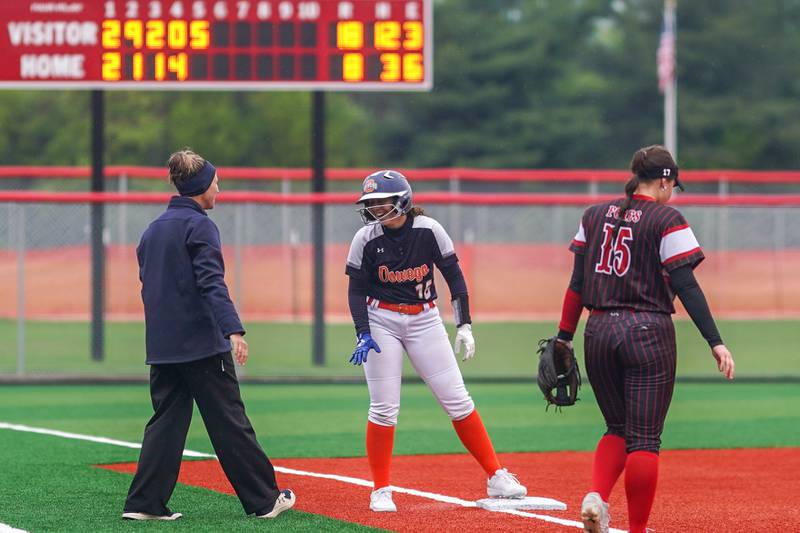 Oswego’s Rikka Ludvigson (16) smiles after hitting a RBI triple against Yorkville during a softball game at Yorkville High School on Thursday, May 9, 2024.