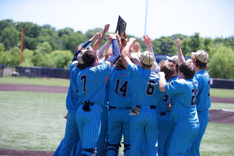 Marquette celebrates the win over Harvest Christian at the Class 1A Sectional Final on Saturday May 25, 2024 in Elgin.