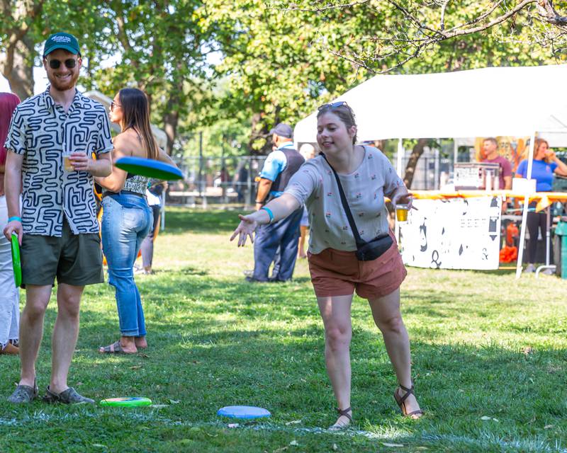 Allison and Eric Sulita play a frisbee game at the Berywn Brewfest. Sept 14, 2024 in Berwyn.