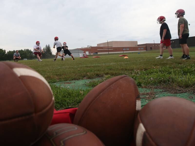 Hall football players practice on Tuesday, July 9, 2024 at Hall High School.