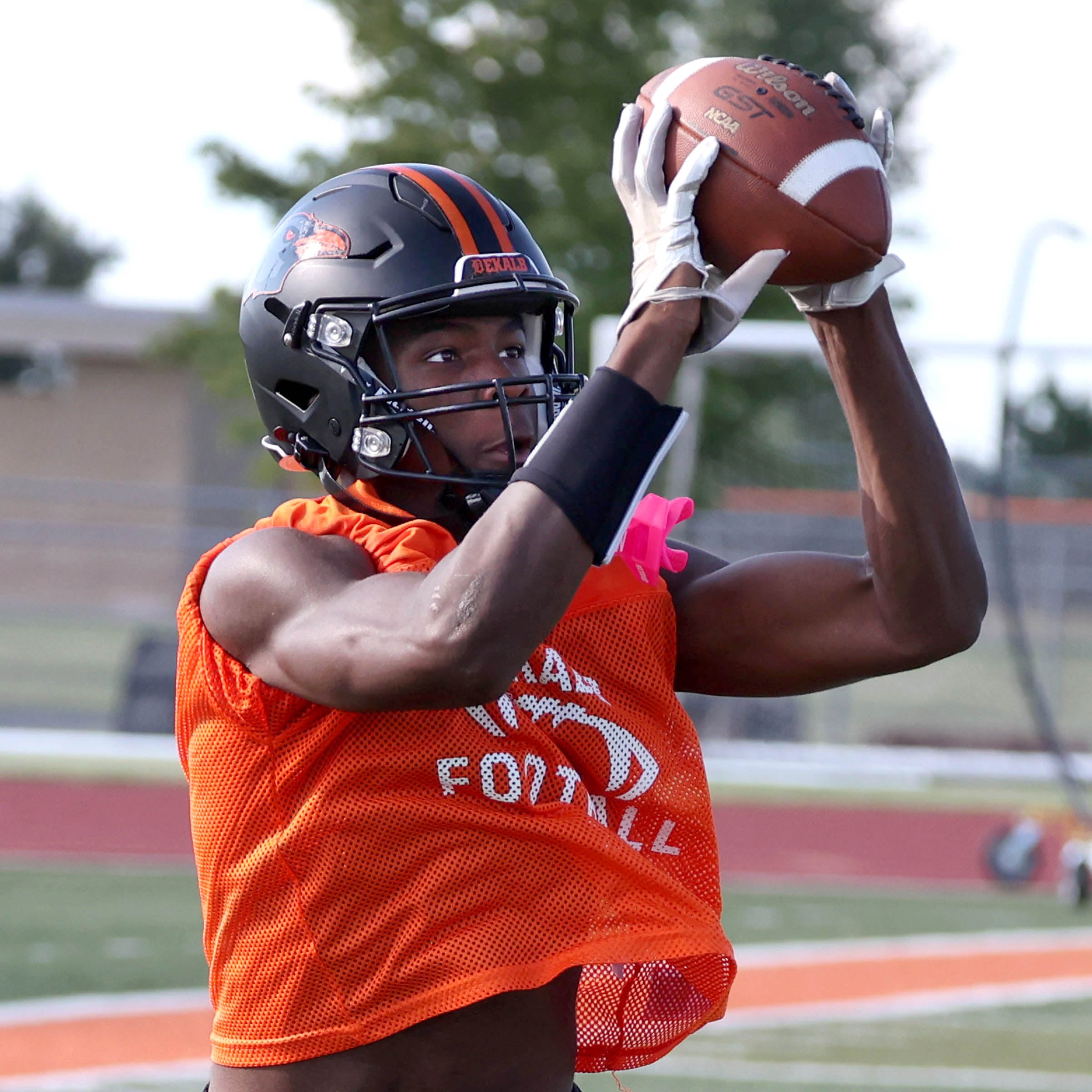 Dekalb’s Davon Grant catches a pass Monday, Aug. 12, 2024, at the school during the first practice of the regular season.