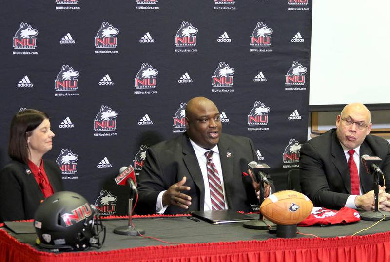 Thomas Hammock speaks at a press conference Friday at Northern Illinois University after being introduced as the new head football coach at the school. Hammock is flanked by NIU President Lisa Freeman and Sean Frazier, NIU athletic director.