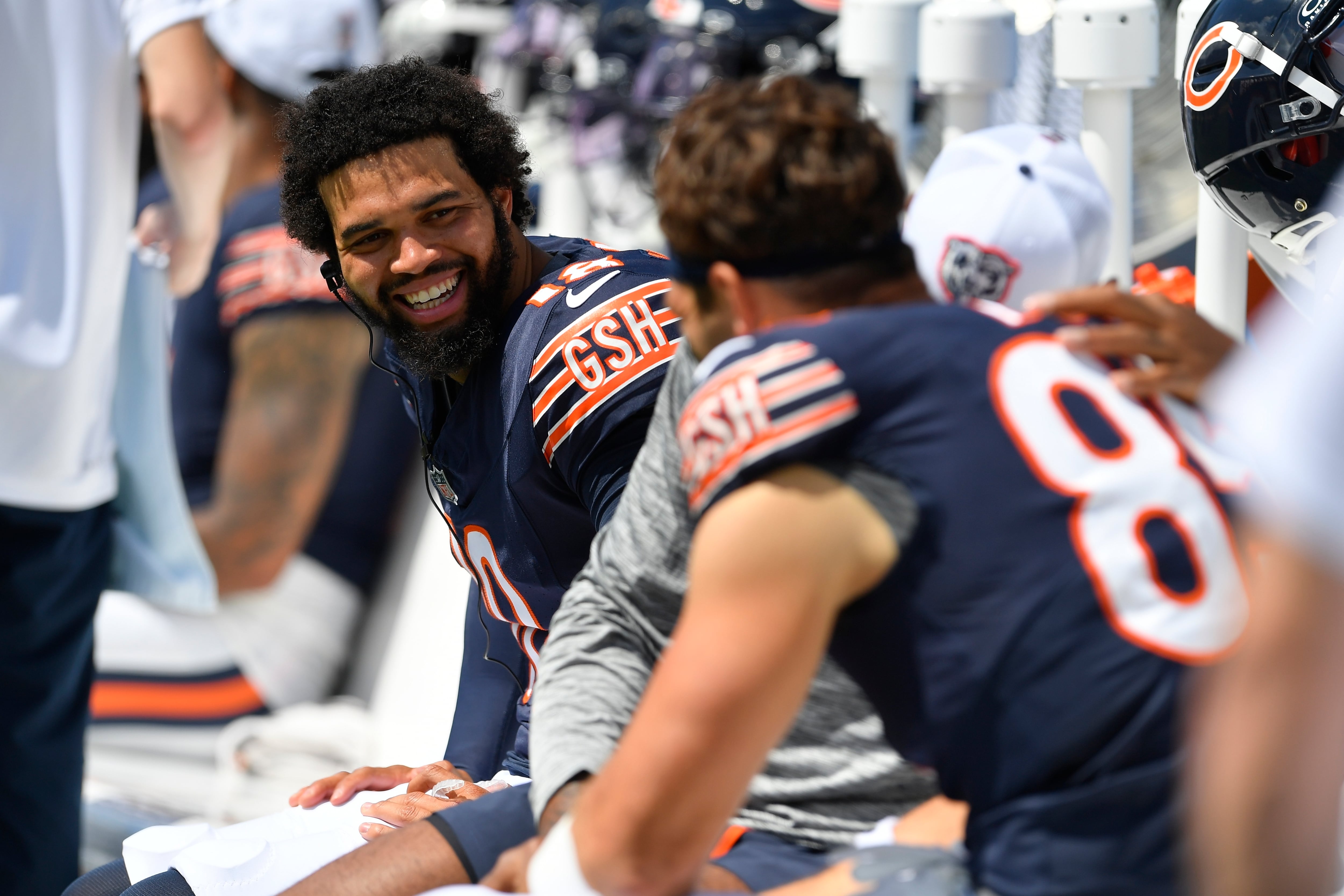 Chicago Bears quarterback Caleb Williams talks with teammates during the first half of an preseason NFL football game against the Buffalo Bills, Saturday, Aug. 10, 2024, in Orchard Park, NY. (AP Photo/Adrian Kraus)