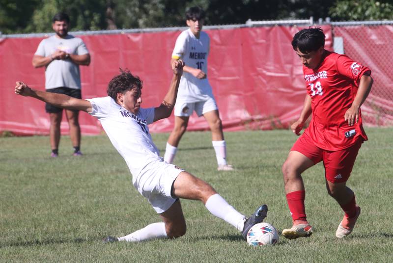 Mendota's Cesar Casas kicks the ball away from Streator's Jordy Sanchez on Saturday, Aug. 31, 2024 at James Street Recreation Area in Streator.