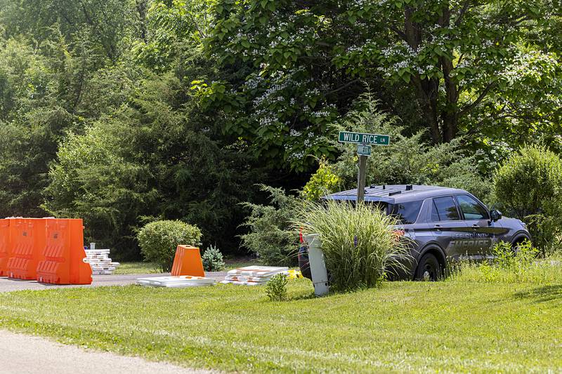 A barricade is set up at the corner of Wild Rice Lane and Minnesota Drive in Lost Nation on Wednesday, June 12, 2024.