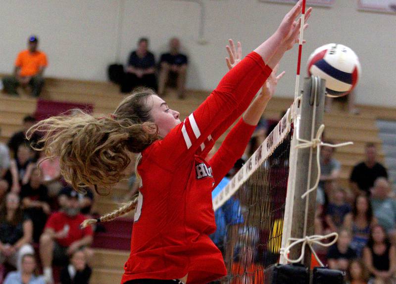 Huntley’s Georgia Watson blocks against Crystal Lake Central during a Fox Valley Conference volleyball match on Tuesday, Aug. 27, 2024, at Huntley High School.