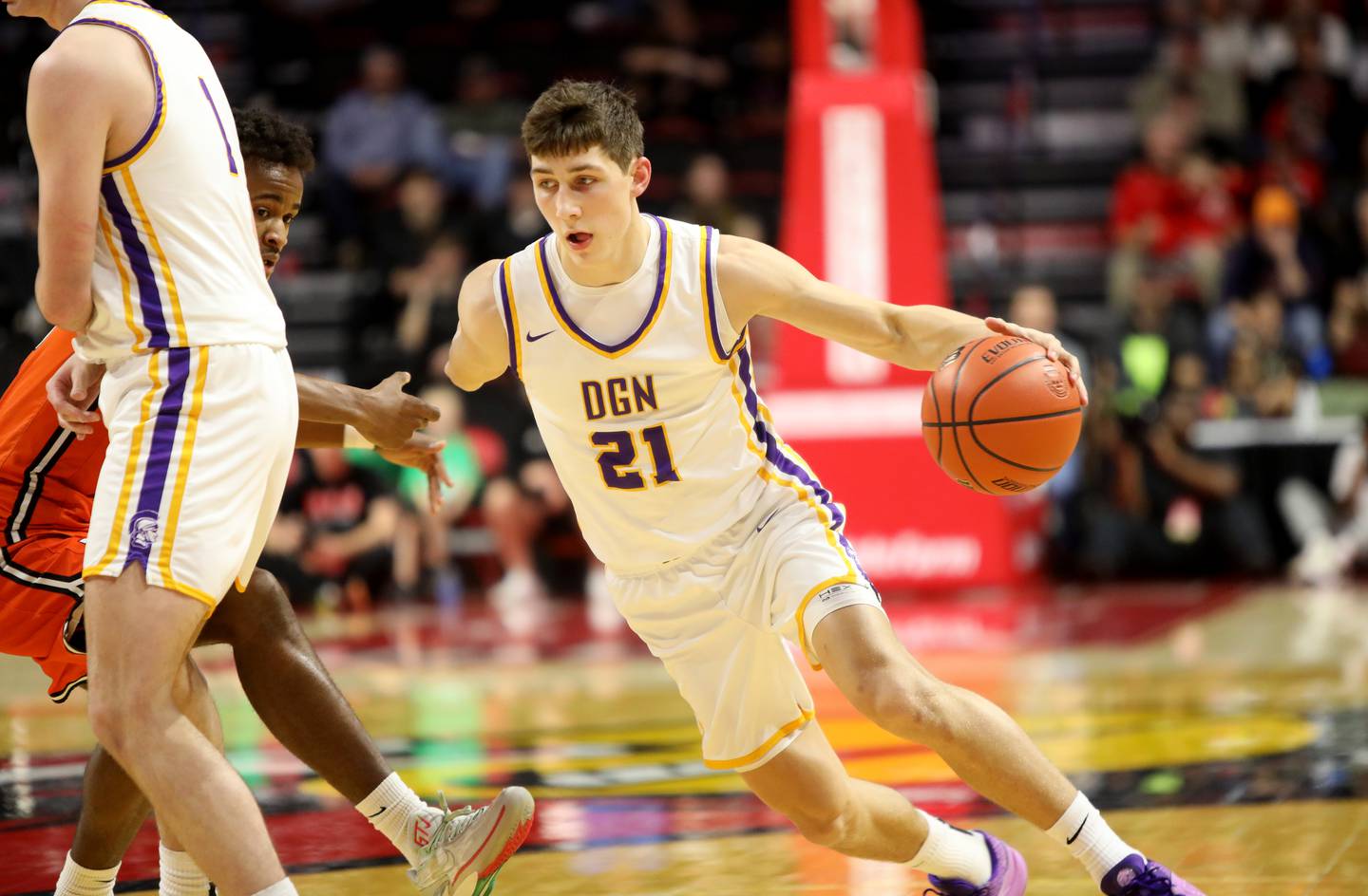 Downers Grove North’s Jack Stanton drives toward the basket during the Class 4A Normal Supersectional game against Normal Community on Monday, March 4, 2024.