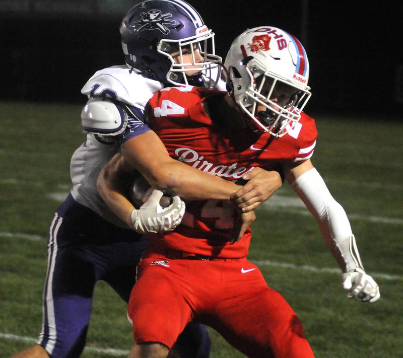 Rochelle's Dylan Manning tackles Ottawa's Weston Averkamp at King Field on Friday, Oct. 18, 2024.