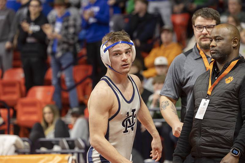 Sterling Newman Central’s Brady Grennan celebrates his win over Richland’s Carson Bissey in the 132 1A pound third place match Saturday, Feb. 17, 2024 at the IHSA state wrestling finals at the State Farm Center in Champaign.