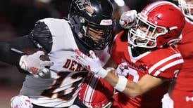 Photos: DeKalb football travels east for a DVC game with Naperville Central