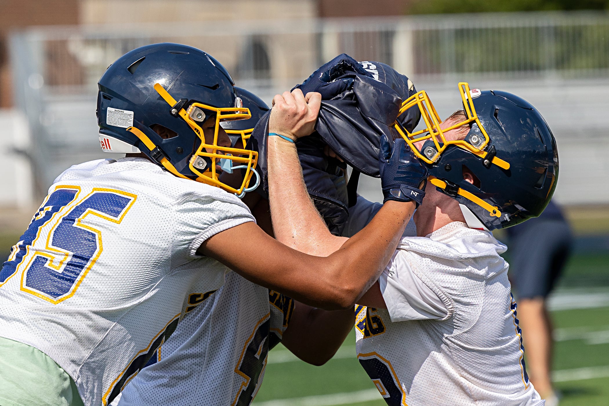 Sterling players run through drills Tuesday, Aug. 13, 2024 during the first week of football practice.