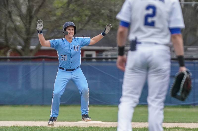 Lake Park's Christopher Ray (20) reacts after hits a two run double against Geneva during a baseball game at Geneva High School on Wednesday, April 17, 2024.