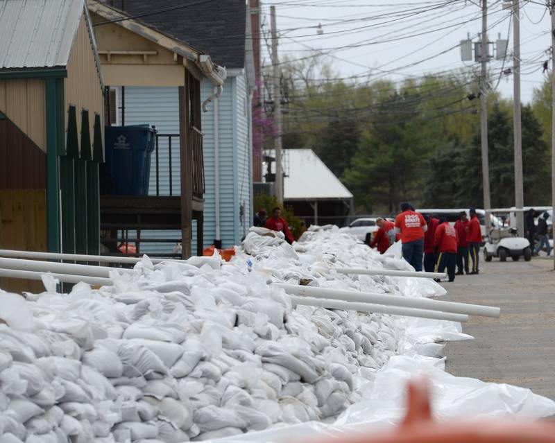 Savanna and Carroll County officials along with inmates from Kewanee were busy placing sandbags behind the downtown business district on Saturday as Mississippi River levels continued to rise. The river was expected to crest at 22' later this week. Flood stage is 16'. The 2019 flood reached 21', Savanna officials began preparing for the flood several weeks ago.