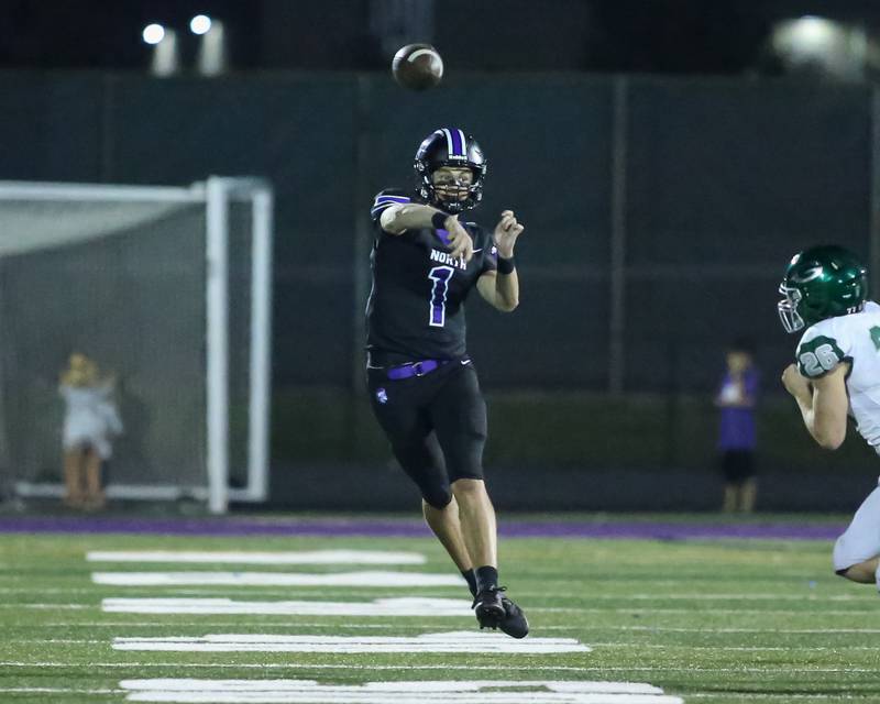 Downers Grove North's Owen Lansu (1) passes during a football game between Glenbard West at Downers Grove North on Friday, Sept 13th, 2024  in Downers Grove.