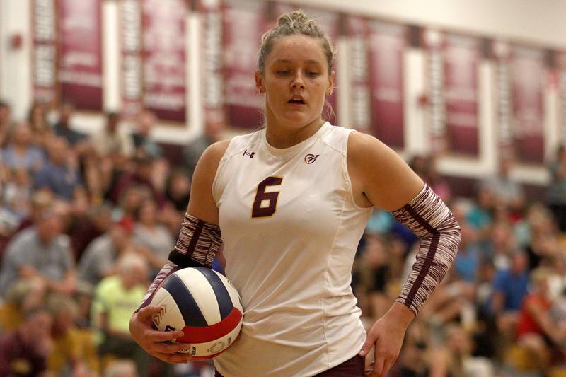 Richmond-Burton’s Elissa Furlan prepares to serve against Woodstock North in varsity volleyball on Monday, Sept. 16, 2024, at Richmond-Burton High School in Richmond.