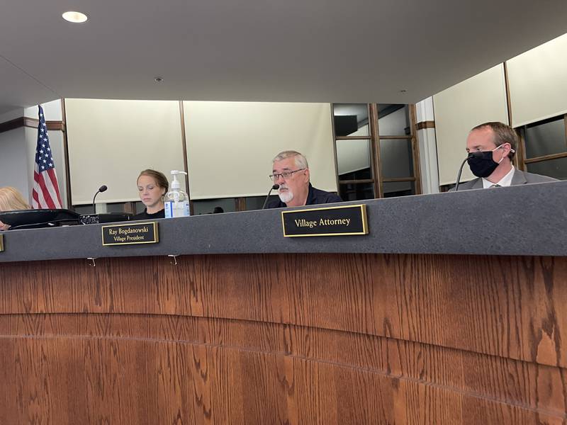 Lake in the Hills' Village President Ray Bogdanowski gives a comment about UpRising Bakery at the village's meeting on Tuesday, Sept. 20, 2022. More than 80 people attended the meeting.