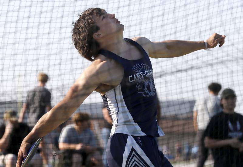 Cary-Grove’s Logan Abrams throws the discus during the Huntley IHSA Class 3A Boys Sectional Track and Field Meet on Wednesday, May 15, 2024, at Huntley High School.