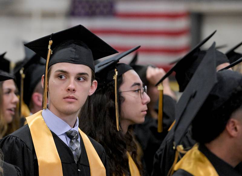 Christian Biedron looks off into the crowd during the 2024 Sycamore High School commencement in Sycamore on Sunday, May 26, 2024.