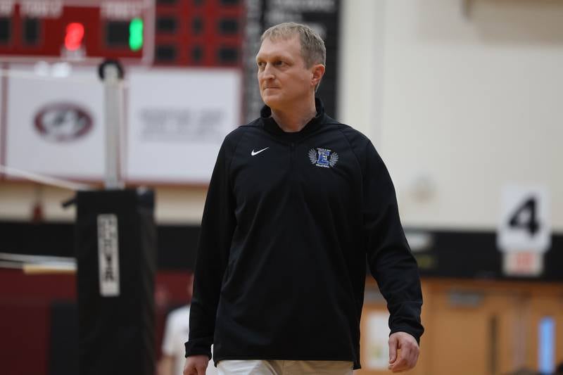 Lincoln-Way East head coach Kris Fiore watches the match against Plainfield North on Tuesday, April 2, 2024.