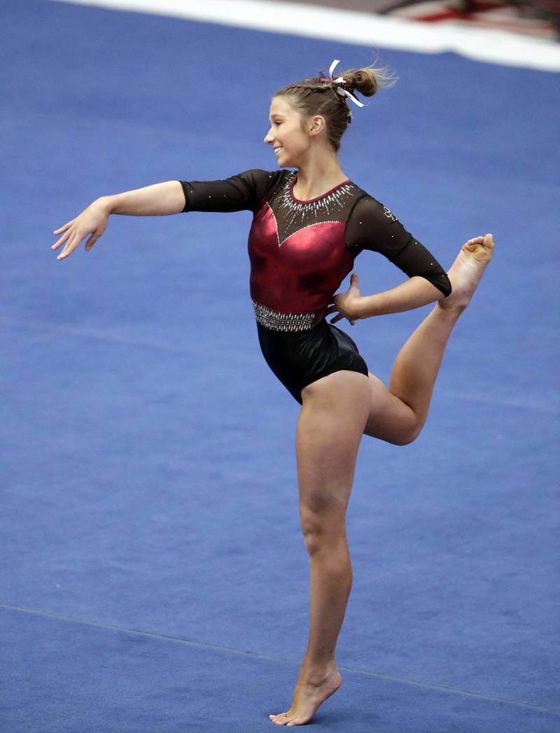 Prairie Ridge's Thea Scheuer competes in the floor exercise during the IHSA Girls Gymnastics State Final meet Friday February 18, 2022 at Palatine High School.