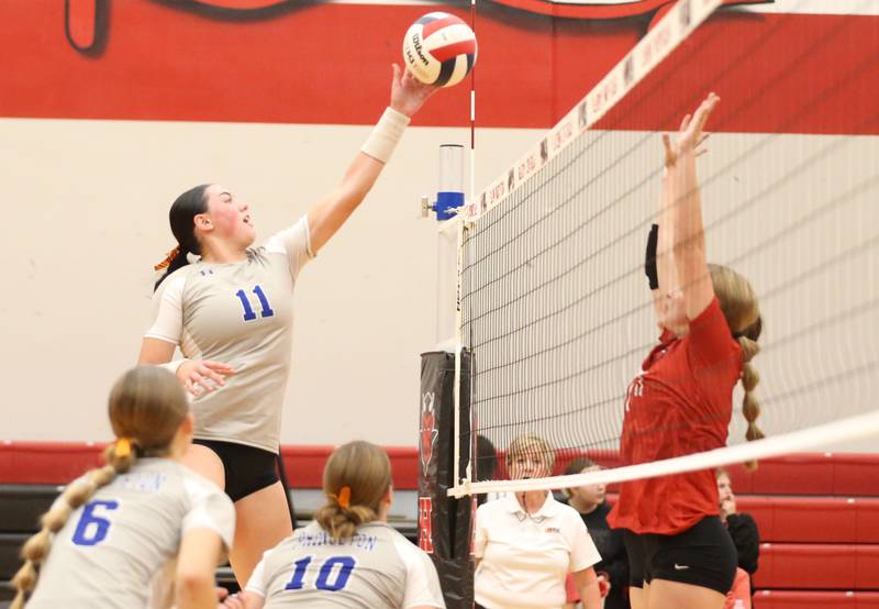 Princeton's Keely Lawson pushes the ball over to the Hall side of the net on Tuesday, Sept. 17, 2024 at Hall High School.